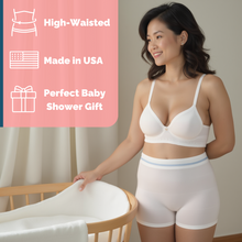 Load image into Gallery viewer, Woman stands next to bassinet while wearing Popped Postpartum Underwear. Text says that the underwear is high-waisted, made in the USA, and a perfect baby shower gift
